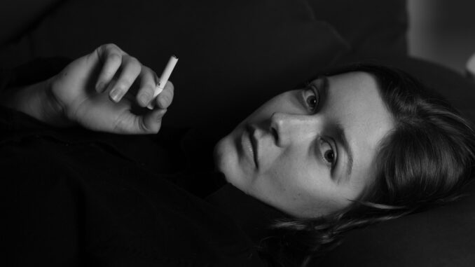 moody woman smoking