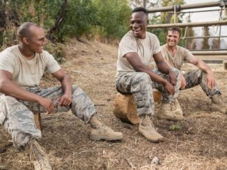 3 soldiers like the ones in battlefield 6 talking and laughing