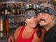 guy with bandana and wife in bar like a road house remake