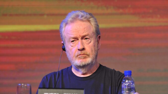ridley scott looking very grumpy, probably because of illennials and their cellphones