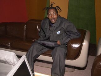 Coolio, sat on a sofa with a keyboard in his lap. Gangster’s Paradise