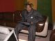 Coolio, sat on a sofa with a keyboard in his lap. Gangster’s Paradise