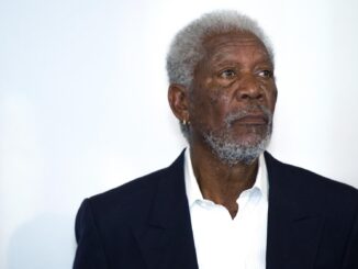 Morgan Freeman looking serious against a white backgroud. Shawshank redemption sequel