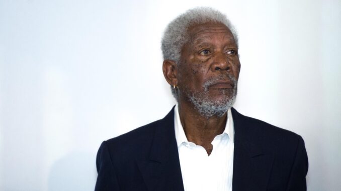 Morgan Freeman looking serious against a white backgroud. Shawshank redemption sequel