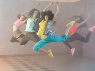 four hip hip dancers leaping into the air. Little women ii