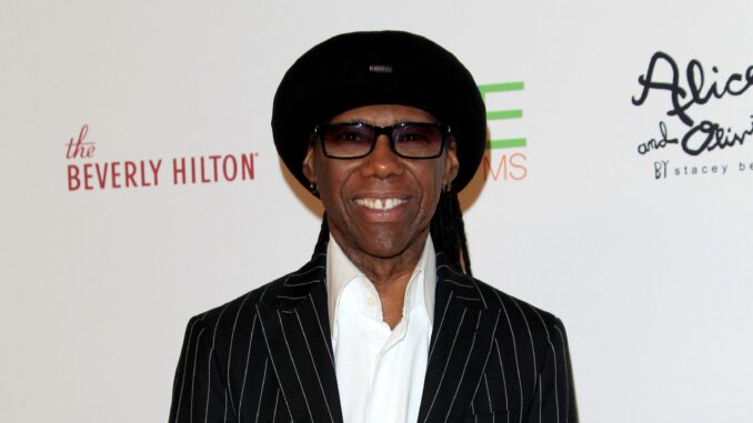 death on the nile rodgers from head up in black suit