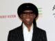 death on the nile rodgers from head up in black suit
