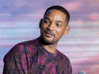 Will Smith in bright coloured top from chest up. Will Smith oscar