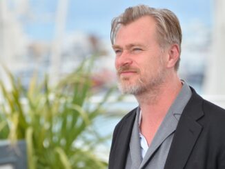 headshot of Christopher nolan. new film Oppenheimer