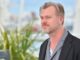 headshot of Christopher nolan. new film Oppenheimer