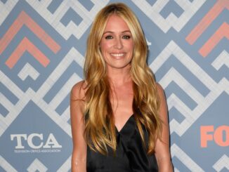 big Cat Deeley smiling from waist up