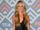big Cat Deeley smiling from waist up
