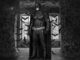 batmoon in empty room surrounded by bats. Batman reboot.
