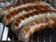 4 sausages on a grill. Gorr the God Butcher