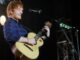 ed sheeran dead in concert singing with an accoustic guitar