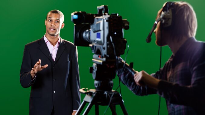 A presenter being filmed. new Disney+ ‘making of’