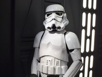 a Death Star stormtrooper waist up pictured in death star corridor