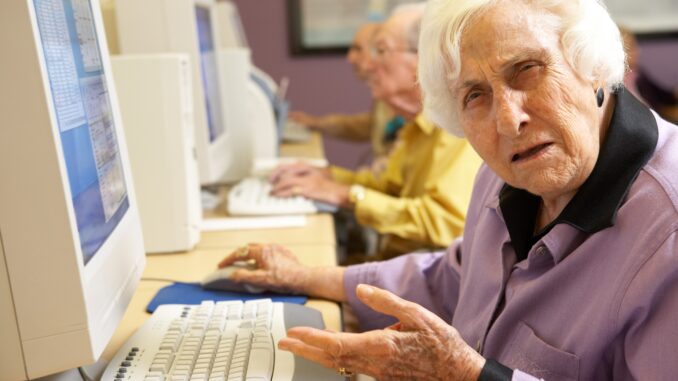 An old woman at a computer looking confused that a new film not set in multiverse