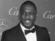 Black and White. Idris Elba in tux from shoulders up. Luther film