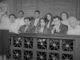 Portrait of a female advocate pointing with jurors sitting together in the witness stand at court house. 12 Angry Men.