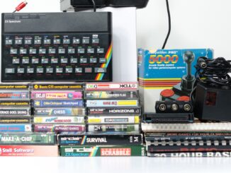 A retro vintage nostalgic sinclair zx spectrum 48k 1980s computer console with games and retro joystick controllers on a white background. Jet Set Willy series