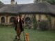 Bilbo aboutside a hobbit house. New Lord of the Rings films