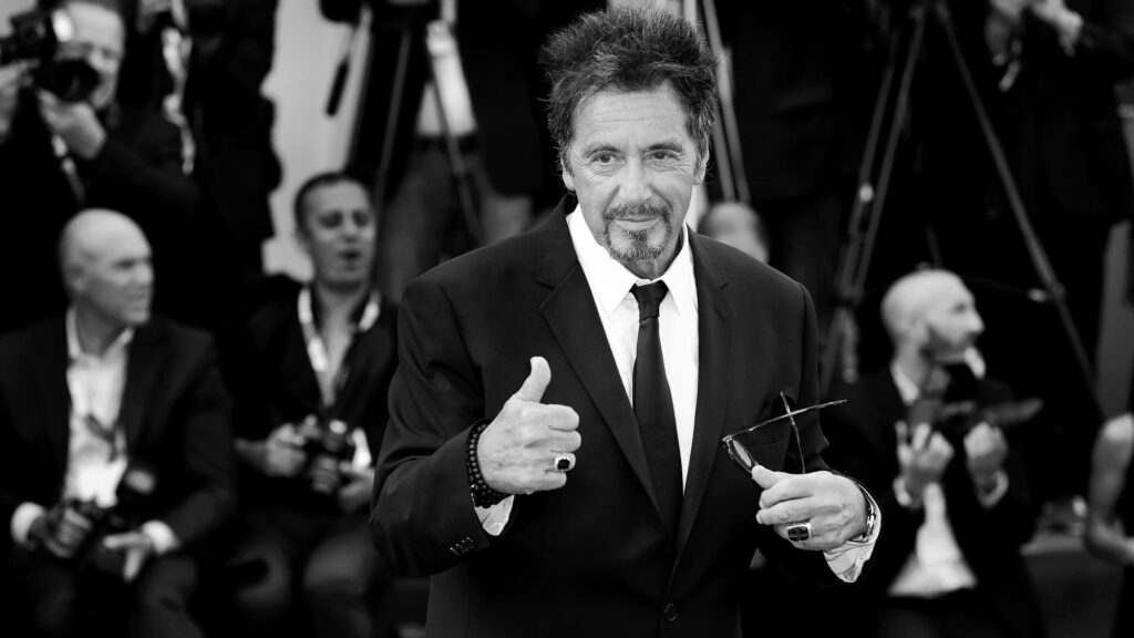 Al Pacino. In front of a crowd giving a thumbs-up