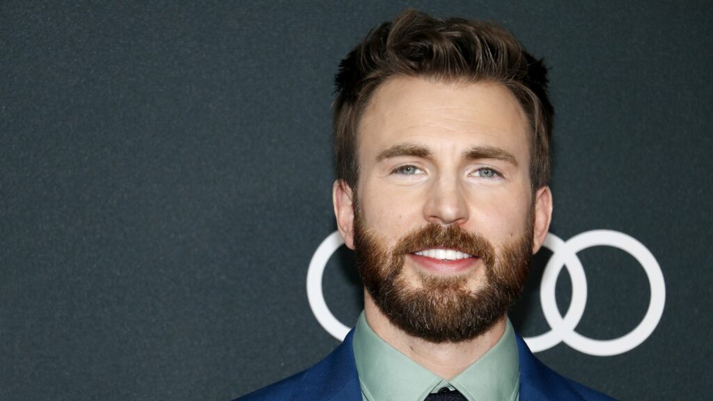 chris evans. With beard headshot against black background