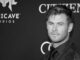 black and white headshot of chris hemsworth