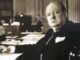 winston churchill sat at a desk. Darkest Hour