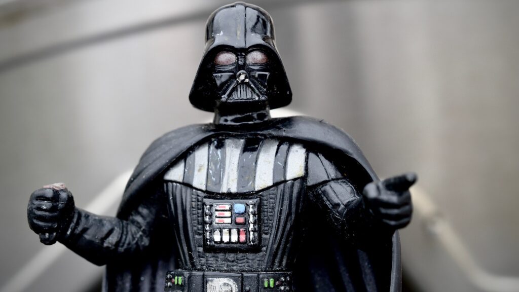 A toy Darth Vader, photographed to look human sized