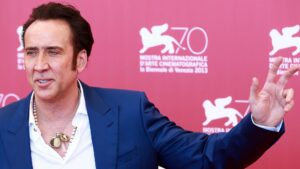 Star of Con air Nic Cage waving