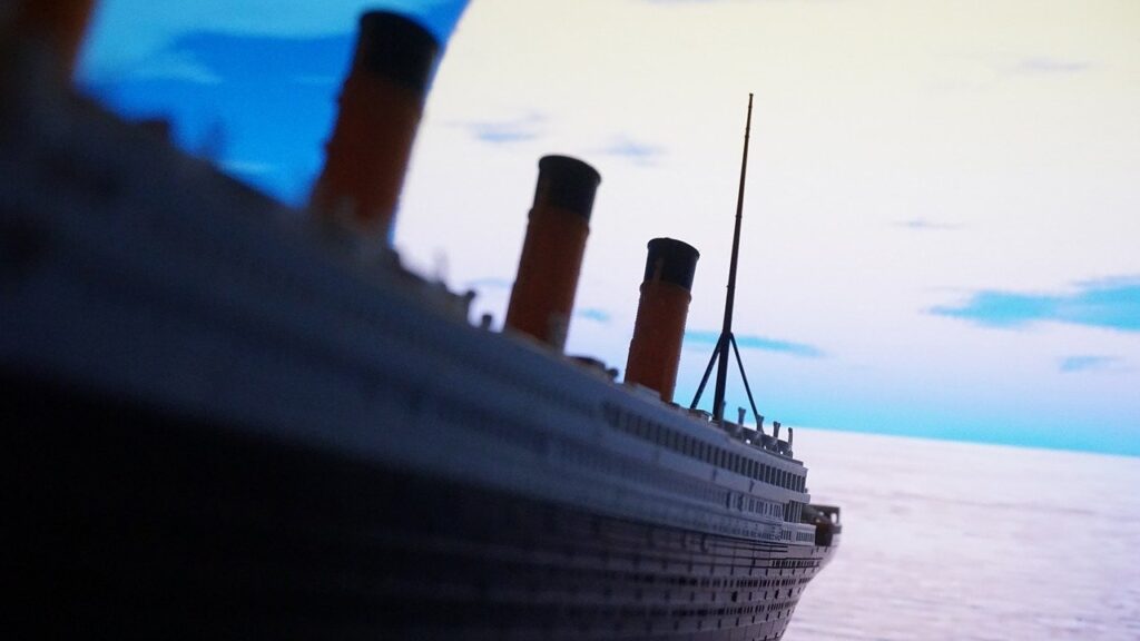 a replica of titanic shot from low towards the back