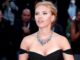 Scarlett Johansson from shoulders up in black dress
