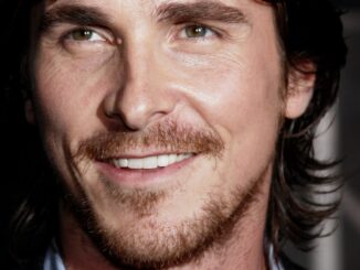 Christian Bale close up on face preapre for batman begins