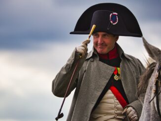 An actor playing napoleon trailer salutes the camera